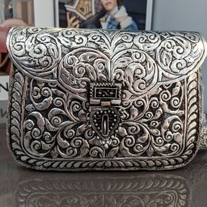 From St Xavier Atria Metal Clutch Anthropologie